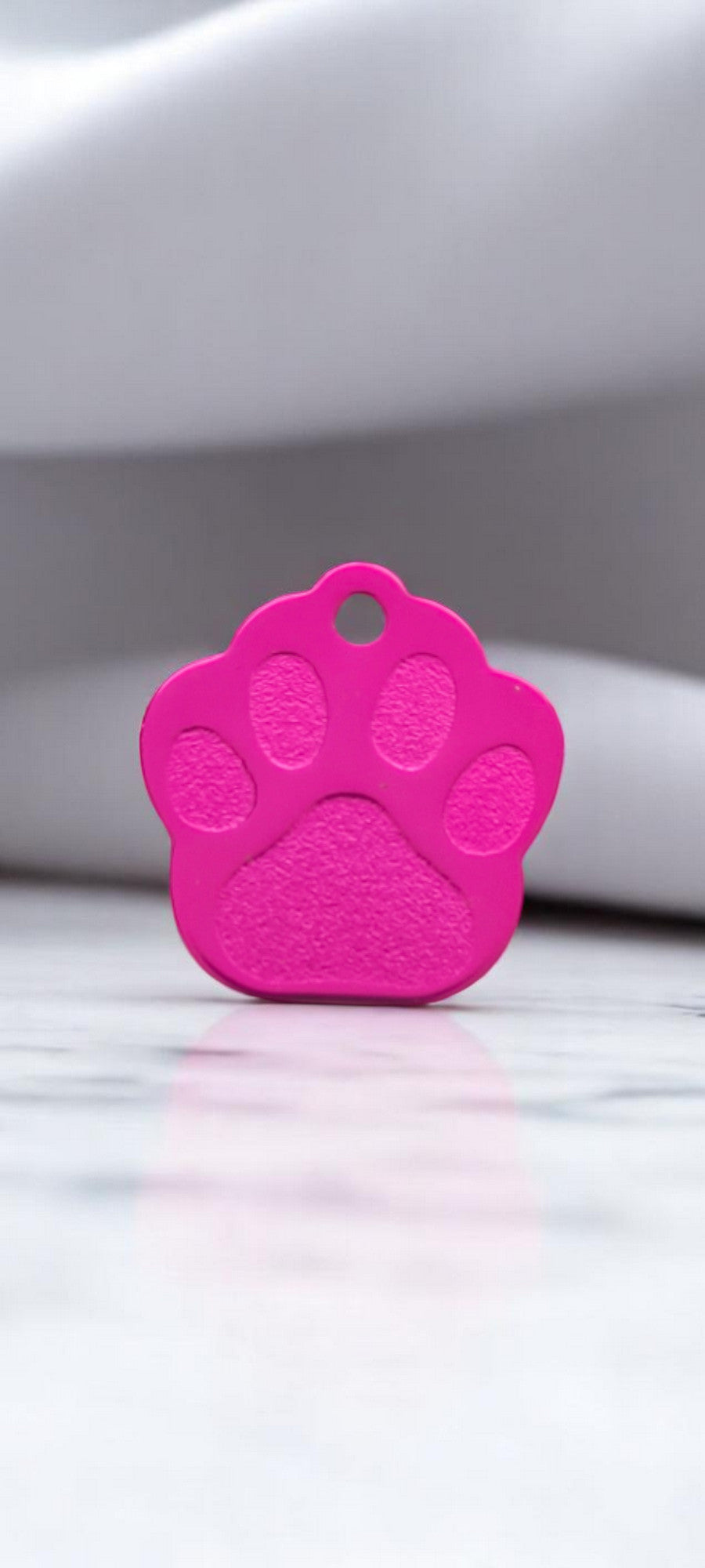 Médaillon patte rose