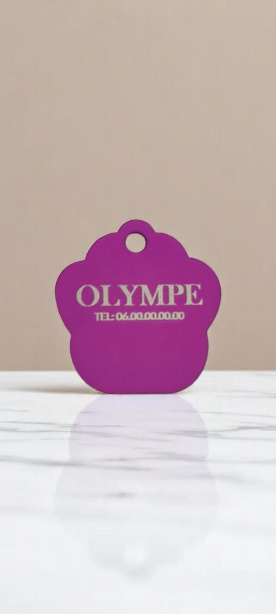 Medaglione a forma di zampa viola